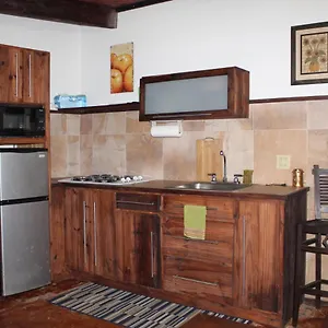 https://machukas-black-sand-apartment-1.greaterantilleshotels.net